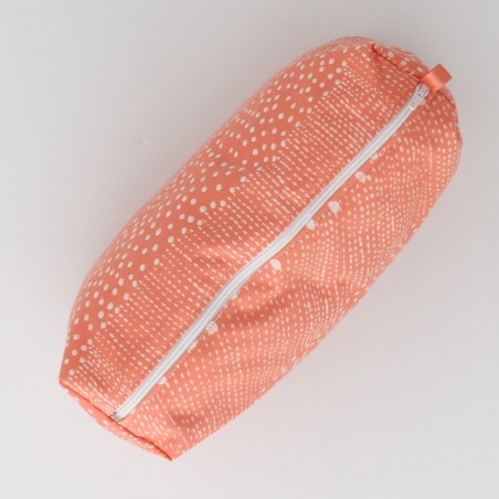 Trousse cosmétique orange et impression crème