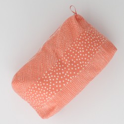 Trousse cosmétique orange et impression crème